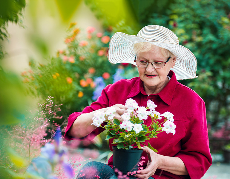 A senior woman gardens in georgia.